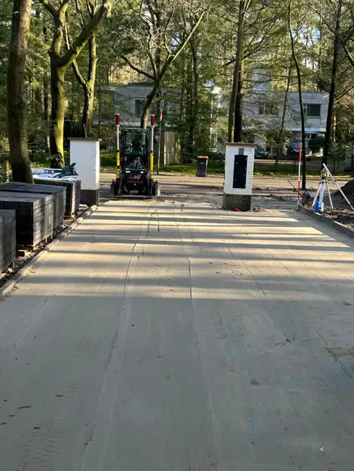 Minigraver en shovel in actie